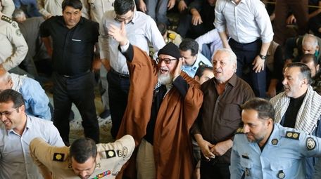 Iranian worshipers shout anti-US slogans during the weekly