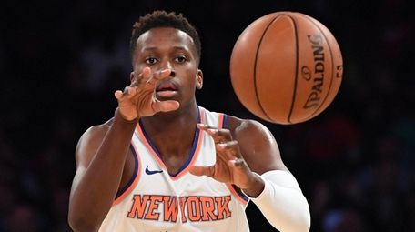 Knicks guard Frank Ntilikina passes the ball against