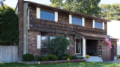 This four-bedroom Colonial, on a cul-de-sac, is listed