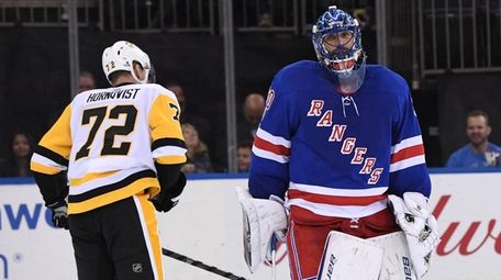New York Rangers goalie Henrik Lundqvist reacts after