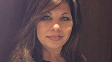 Kelly Choulis Auffret of Holtsville has been hired