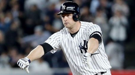 Chase Headley of the Yankees reacts after reaching