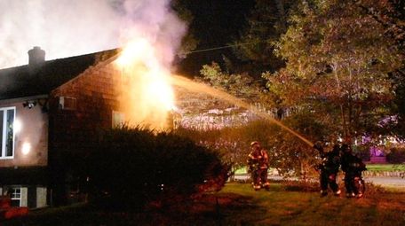 Firefighters battle a blaze at Teed Street and