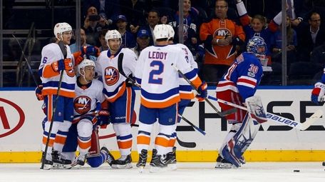 The Islanders' Anders Lee #27 celebrates his first-period