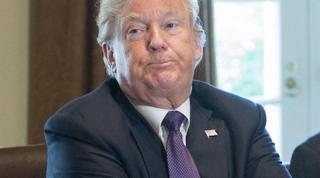 President Donald Trump speaks during a meeting on