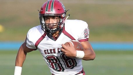 Glen Cove's Michael Vaughan (88) runs the ball