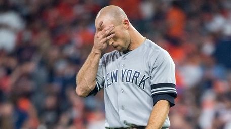 New York Yankees outfielder Brett Gardner reacts after