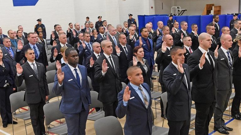 Newly sworn-in Suffolk County police recruits at the