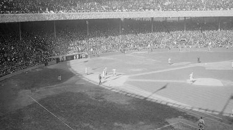 Yankees outfielder Elmer Miller scores in game 2