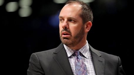 Frank Vogel of the Magic reacts against the