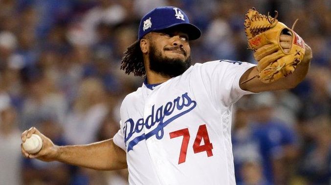 Dodgers closer Kenley Jansen throws to a Cubs