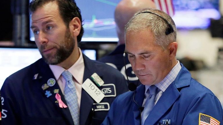 Specialist Michael Pistillo, left, and trader Timothy Nick
