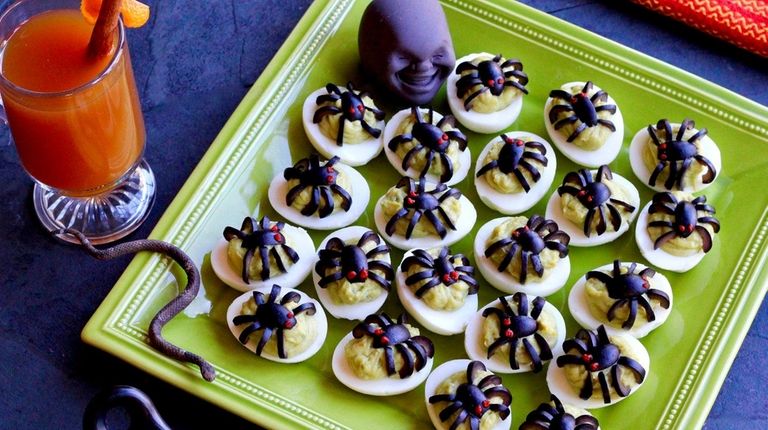 Deviled eggs made with avocado are topped with