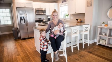 Kate Reilly with her children, Brendan and Emma,