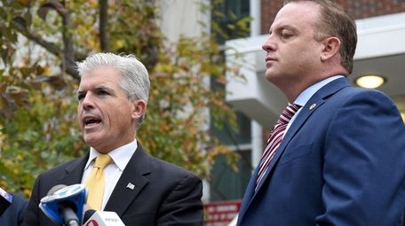 Suffolk County executive Steve Bellone, on steps of