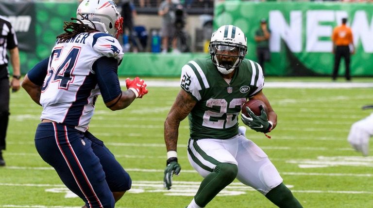 Jets running back Matt Forte tries to
