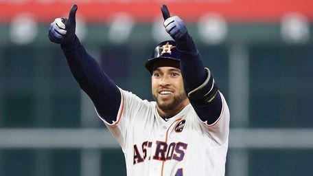 Astros outfielder George Springer reacts after hitting a