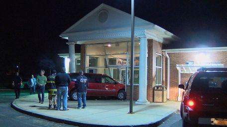 Suffolk County police and Greenlawn firefighters responded after