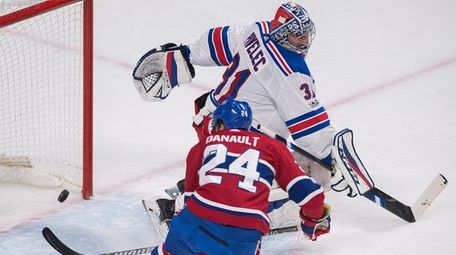 Montreal Canadiens' Phillip Danault scores against New York