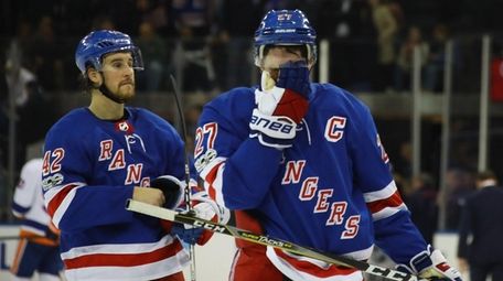 The Rangers' Brendan Smith and Ryan McDonagh leave