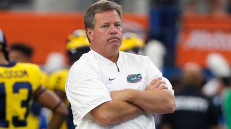 Florida head coach Jim McElwain watches his team