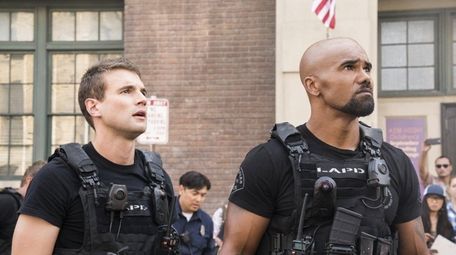 Alex Russell and Shemar Moore, right, star in