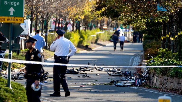 Bicycles and debris lay on a bike path