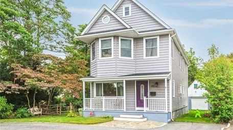 This three-bedroom, 2½-bath Colonial at 45 Smith Street