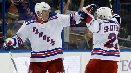 Rangers left wing J.T. Miller celebrates his overtime
