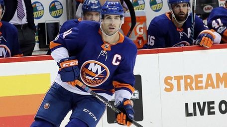 Islanders center John Tavares skates against the Avalanche on