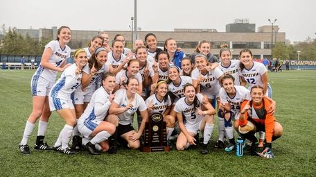 Hofstra celebrates its victory over Northeastern in the