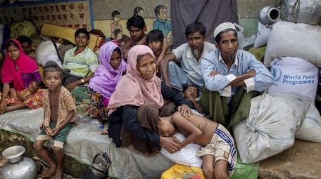 Rohingya Muslims, who crossed over from Myanmar into