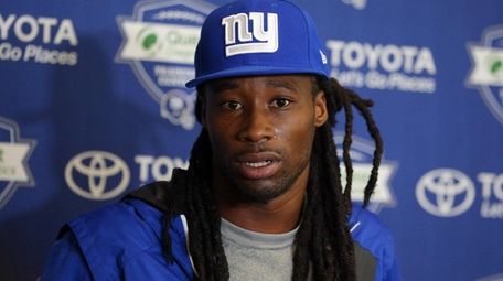 Giants cornerback Janoris Jenkins (20) speaks with the