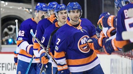 The Islanders' Jordan Eberle is congratulated by his teammates