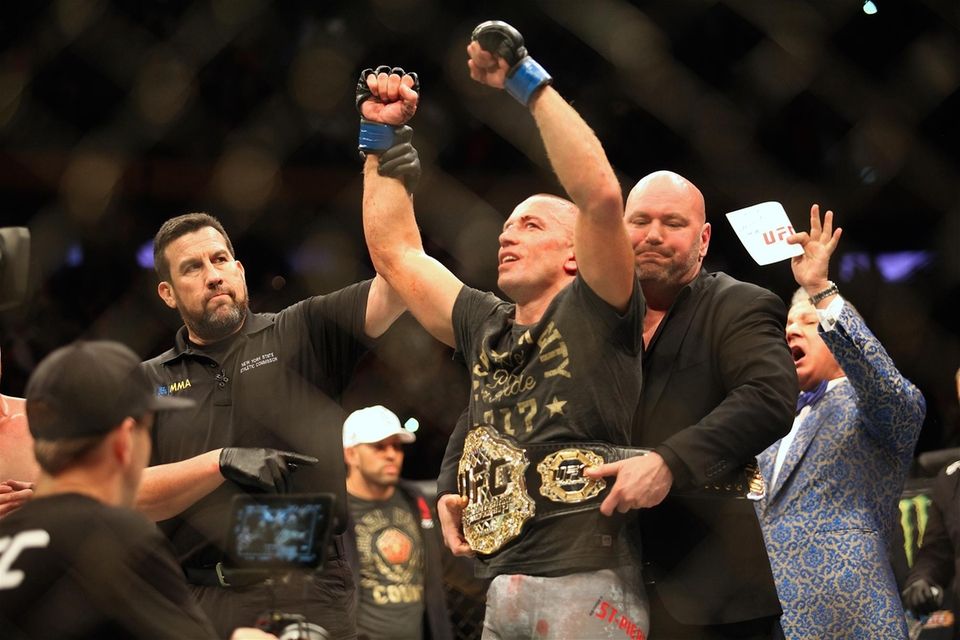 Georges St-Pierre received the middleweight title belt from
