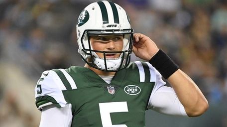 Jets quarterback Christian Hackenberg looks on from the