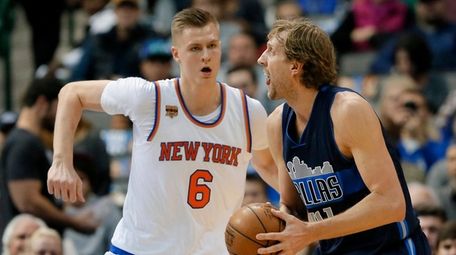 Kristaps Porzingis defends against Dirk Nowitzki on Jan.
