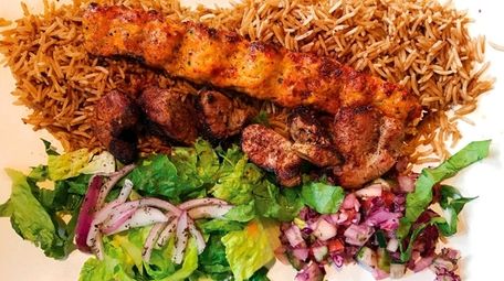 Lamb and kofta kebab over basmati rice at