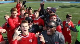 Center Moriches players celebrate after winning the state