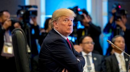 President Donald Trump attends a meeting Monday for