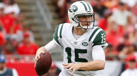 Josh McCown of the Jets looks for a