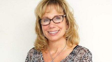 Eileen Familia of East Islip has been hired