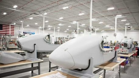 The manufacturing floor at CPI Aerostructures is shown