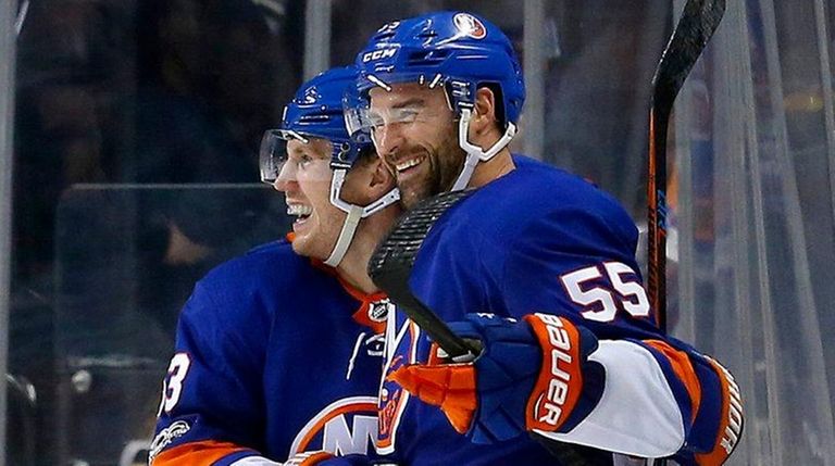 The Islanders' Johnny Boychuk celebrates a goal against
