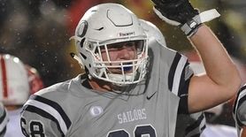 Michael Scibelli #68 of Oceanside reacts after a