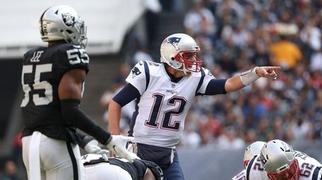 Tom Brady of the New England Patriots directs