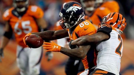 Denver Broncos wide receiver Demaryius Thomas is tackled