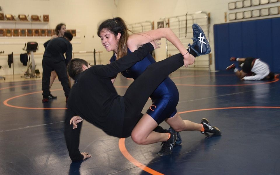 Nassau Community College women's wrestler Carolyn Herrera practices