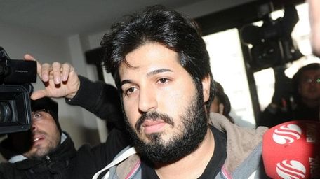 Reza Zarrab arrives at a police center in