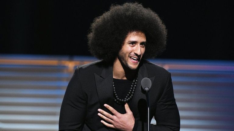 Colin Kaepernick receives the SI Muhammad Ali Legacy